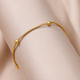 Gold bedded bracelet